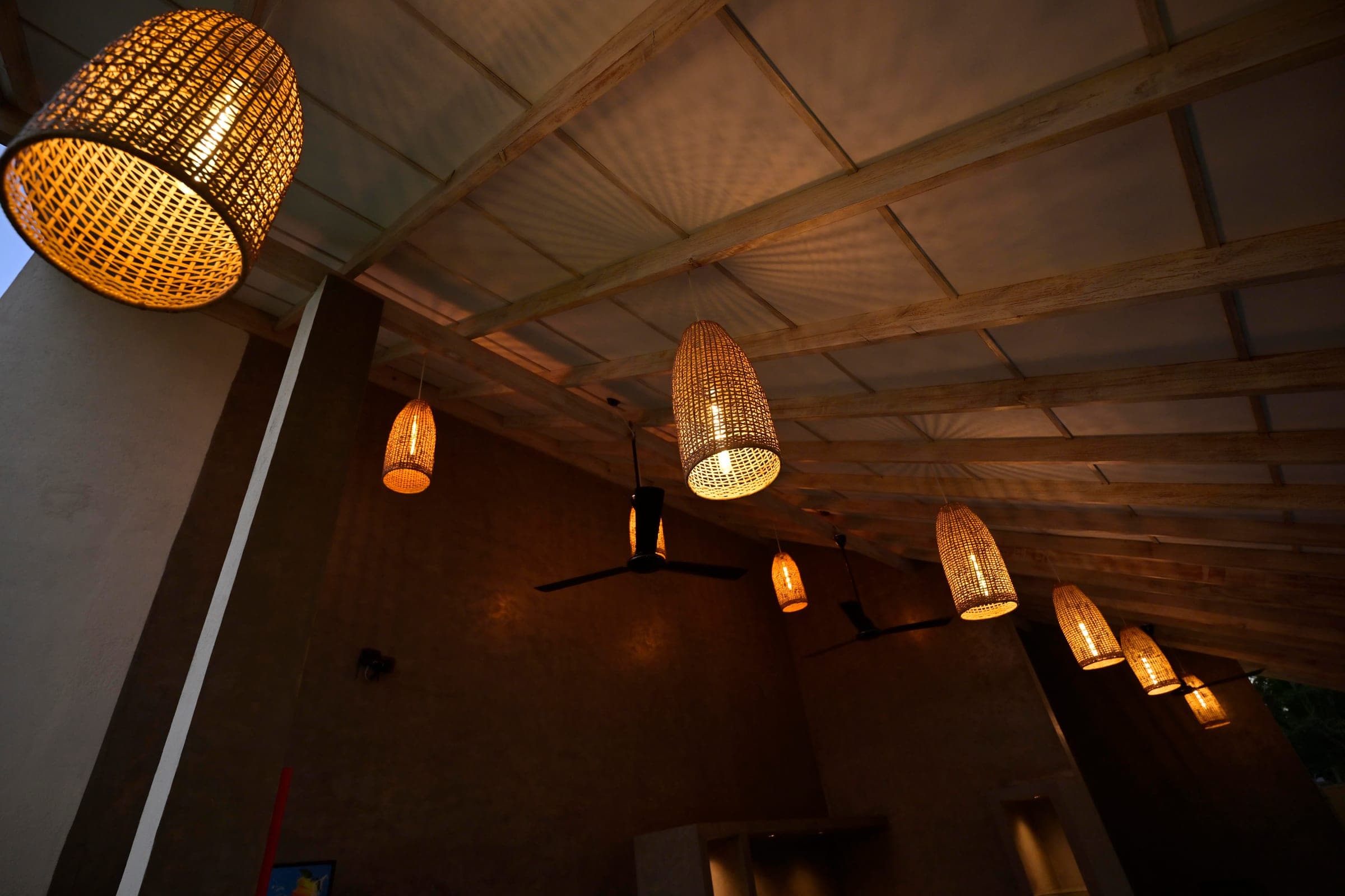 Hanging light installations at dusk